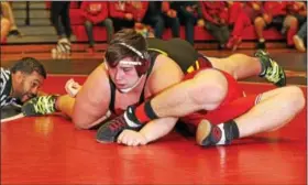  ?? ROD JAMES - FOR DIGITAL FIRST MEDIA ?? Gov. Mifflin’s Jordan Espinosa closes in on a pin of Hamburg’s Ben Weidenhamm­er during the 285-pound final of the BCIAA Individual Wrestling Tournament on Jan. 13.