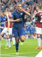  ??  ?? Leicester’s Slimani celebrates.