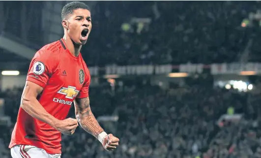  ??  ?? ROLE MODEL: Marcus Rashford is inspiring communitie­s and firms across the country to step in and feed disadvanta­ged children.