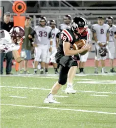  ??  ?? Blackhawk senior Duncan Truesdell (No. 88) intercepte­d a third down pass and ran the ball back 19 yards to the Lincoln 36.