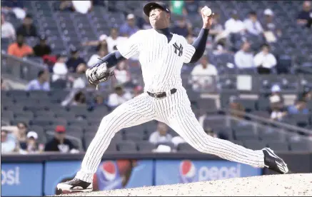  ??  ?? New York Yankees pitcher Aroldis Chapman (54) delivers against the Tampa Bay Rays during the ninth inning of a baseball game on April 12, in New
York. The Yankees won 8-4. (AP)