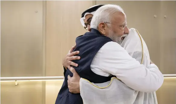  ?? Mohamed Al Hammadi / UAE Presidenti­al Court ?? President Sheikh Mohamed receives Indian Prime Minister Narendra Modi at the Presidenti­al Airport in Abu Dhabi yesterday