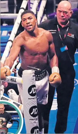  ?? ?? A foorlorn Anthony Joshua leaves the ring after his de efeat to Oleksandr Usyk last night