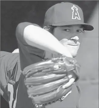  ?? Luis Sinco Los Angeles Times ?? WITH THE ANGELS’ season on the line, C. J. Wilson says he is looking forward to pitching in front of a raucous crowd today in Kansas City’s Kauffman Stadium.