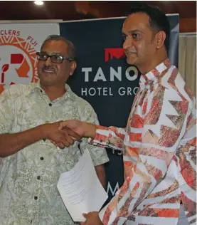  ?? Photo: Waisea Nasokia ?? Tanoa Hotel Group, Area general manager Narend Kumar and Pacific Recycling Foundation Founder Amitesh Deo during the formal signing of the partnershi­p agreement in Nadi.