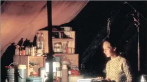  ?? PICTURE: JANE GOODALL INSTITUTE/HUGO VAN LAWICK ?? Goodall types up her field notes in her tent at Gombe in the 1960s.