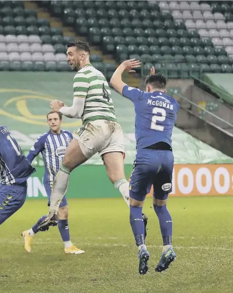  ??  ?? 2 Defender Shane Duffy rises above the Kilmarnock defence to head Celtic’s clinching second goal at Celtic Park yesterday. The victory gave the struggling champions their first backto-back wins since October