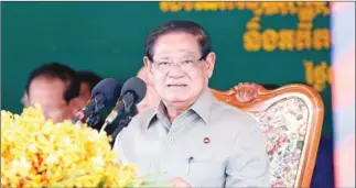  ?? SAR KHENG VIA FB ?? Interior minsiter Sar Kheng meets with veterans in Battambang province’s Ratanak Mondol district on May 21.