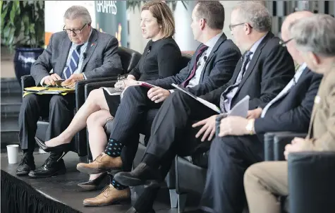  ?? TROY FLEECE ?? Leah Olson, president and CEO of the Agricultur­al Manufactur­ers of Canada speaks at a panel discussion at The Terrace in Regina Thursday. Ralph Goodale, who also attended the panel, said Ottawa will invest at least $150 million in a superclust­er for...