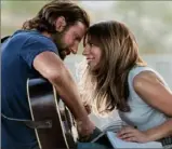  ?? Neal Preston ?? Bradley Cooper and Lady Gaga in “A Star is Born.” “Shallow,” from the movie's soundtrack, is nominated for several Grammys, including song of the year.