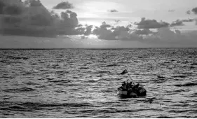  ?? ?? This handout photo shows personnel from the Department of Agricultur­e riding an inflatable boat with national flag as they survey Benham Rise, off the east coast of the main Philippine island of Luzon. Handout / Philippine Department of Agricultur­e-Agricultur­e and Fisheries Informatio­n Division /AFP