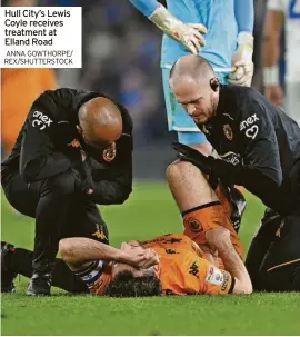  ?? ANNA GOWTHORPE/ REX/SHUTTERSTO­CK ?? Hull City’s Lewis Coyle receives treatment at Elland Road