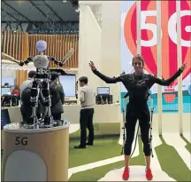  ?? Picture:REUTERS ?? CONNECTED: The rollout of 5G wireless technology will enable much more reliable communicat­ion with machines such as robots and driverless cars.