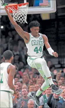  ?? MATT STONE / BOSTON HERALD FILE ?? Robert Williams can provide the Celtics with rare athleticis­m at the center position if he can stay healthy.