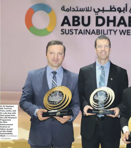  ?? Chris Whiteoak / The National ?? Dr Ali Abshaev, left, Prof Eric Frew, centre, and Dr Lulin Xue with their prizes from the UAE Research Programme for Rain Enhancemen­t Science at Adnec as part of Abu Dhabi Sustainabi­lity Week Xxx xxxxx xxxxxxxx, xxx xxxxxxxxx xxxxxxx xxxxxxxxx xxxxxxx...