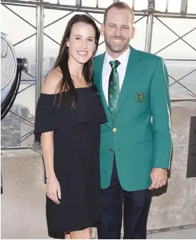  ?? Picture: Getty Images ?? ON TOP OF THE WORLD. Sergio Garcia and his fiancee Angela Akins during a visit to the Empire State Building in New York City on Monday.