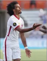  ??  ?? Qatar’s Afram Afif celebrates scoring the second goal of the match against Grenada during their Group D encounter of CONCACAF Gold Cup at the BBVA Stadium in Houston, Texas, on Saturday.