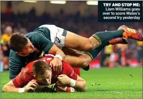  ??  ?? TRY AND STOP ME: Liam Williams goes over to score Wales’s second try yesterday