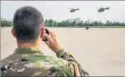  ?? AFP ?? ■ Texas National Guard helicopter­s fly to the Mexico border.