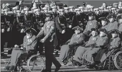  ?? AFP ?? War veterans participat­e in the Remembranc­e Sunday ceremony at the Cenotaph on Whitehall in central London, on Sunday.