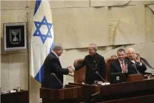  ?? (Marc Israel Sellem/The Jerusalem Post) ?? PRIME MINISTER Benjamin Netanyahu greets Indian President Pranab Mukherjee at the Knesset yesterday.