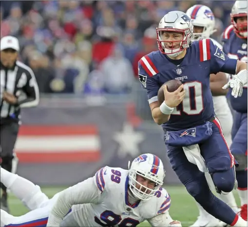  ?? File photo ?? Mac Jones, right, and the New England Patriots have lost their last two games to fall from the No. 1 seed in the AFC to No. 6 headed into Sunday’s clash with the worst team in the NFL, Jacksonvil­le, at Gillette Stadium.
