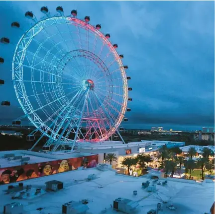  ?? STEPHEN M. DOWELL/AP ?? ICON Park attraction­s, The Wheel, left, Orlando SlingShot, middle, and Orlando FreeFall, right, are shown in Orlando on March 24. The amusement
park where a teenager fell from a ride and died earlier this year has paused a new sniper-like laser shooting game amid criticism in light of recent mass shootings. In a statement issued Saturday, park officials said some had questioned whether it was appropriat­e following mass shootings at a July 4 parade in a Chicago suburb, an elementary school in Uvalde, Texas, and a grocery store in Buffalo, New York.