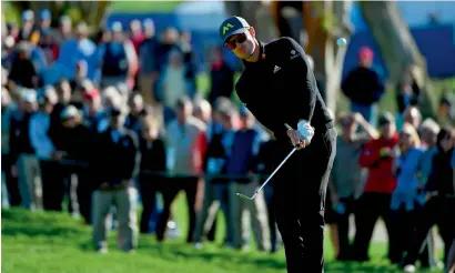  ?? AFP ?? Justin Rose plays his shot during the second round of the Farmers Insurance Open in San Diego, California. —