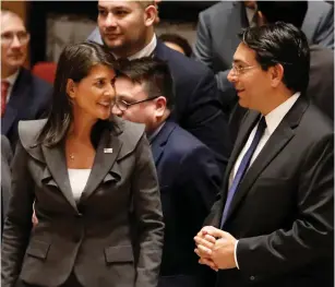  ?? (Shannon Stapleton/Reuters) ?? US AMBASSADOR to the United Nations Nikki Haley speaks with Israeli Ambassador to the United Nations Danny Danon last month at the UN in New York.