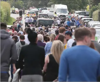  ??  ?? Part of the large attendance at Cameron’s funeral