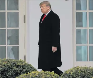  ?? LEAH MILLS • REUTERS ?? U.S. President Donald Trump walks to the Oval Office at the White House after returning from Mar-a-lago on Dec. 31.