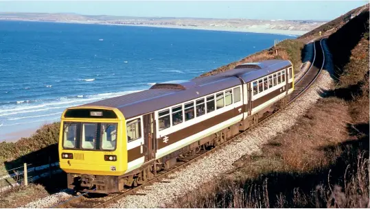  ??  ?? Although Classes 142-144 were branded as ‘Pacers', the batch of 13 initially sent to Laira for services in Devon and Cornwall were known as ‘Skippers' and painted Chocolate & Cream. One such unit No. 142015 is seen at Carbis Bay on the St Ives branch on February 21, 1987.