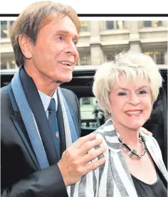  ??  ?? Gloria Hunniford with Sir Cliff Richard outside court