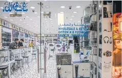  ?? ?? Retail and wholesale electronic­s stores in the Deira district.