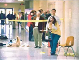  ?? STEVE NAGY/THE PADUCAH SUN 1997 ?? A student recoils at the scene of the shooting at Heath High School near Paducah, Ky. Shooter Michael Carneal will have his first parole hearing this week.