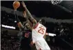  ?? JULIO CORTEZ — THE ASSOCIATED PRESS ?? Rutgers center Myles Johnson (15) goes up for a shot against Maryland forward Jalen Smith (25) during the first half.