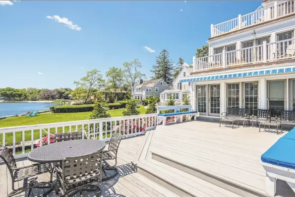  ?? Michelle&Company / William Raveis RE;Westport ?? This Fairfield County home features a multi-level deck which offers views of Long Island Sound and plenty of space for entertaini­ng.