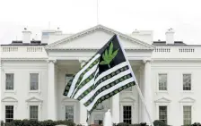  ?? Jose Luis Magana, Associated Press file photo ?? A demonstrat­or waves a flag with marijuana leaves on it during a protest calling for the legalizati­on of marijuana outside of the White House, in Washington, Saturday, April 2, 2016.