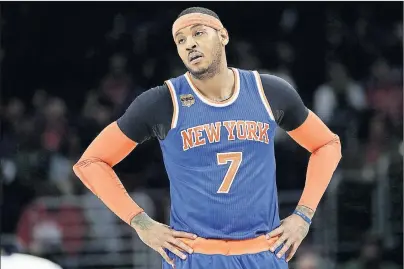  ?? AP PHOTO ?? In this Jan. 11 file photo, New York Knicks’ Carmelo Anthony looks on during a break in an NBA game against the Philadelph­ia 76ers in Philadelph­ia.