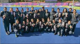  ?? PTI ?? Indian women's hockey team players with their bronze medals after winning against New Zealand in the Women's Field Hockey match at the Commonweal­th Games 2022, in Birmingham, UK, Sunday