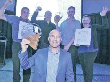  ?? Photos / Warren Buckland ?? Joe Nelson, chief operating officer of Cedenco, with his team, celebratin­g after winning the ASB Exporter of the Year award last night.
