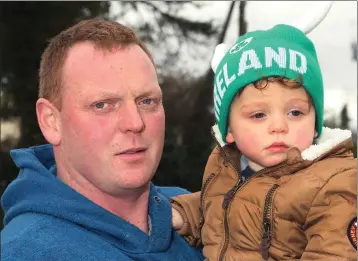  ??  ?? Garrett Kinsella with his son Billy at the St Patrick’s Day parade in Carnew.