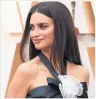  ??  ?? Penelope Cruz with white corsage at ceremony