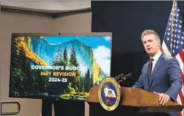  ?? Rich Pedroncell­i Associated Press ?? GOV. Newsom said of his budget: “None of this is the kind of work you enjoy doing, but you’ve got to do it. We have to be responsibl­e. We have to be accountabl­e.”