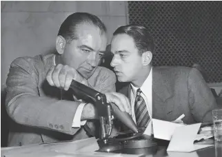  ?? Associated Press 1954 ?? Sen. Joseph McCarthy (left) and his chief counsel, Roy Cohn, conducted a crusade to expose alleged communists throughout society in the 1950s.