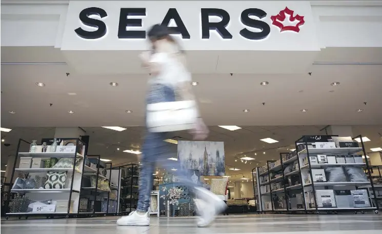  ?? COLE BURSTON/BLOOMBERG ?? Sears Canada plans more cost-cutting measures such as ceasing health, dental and life insurance as it works to find a buyer for the business or its assets.