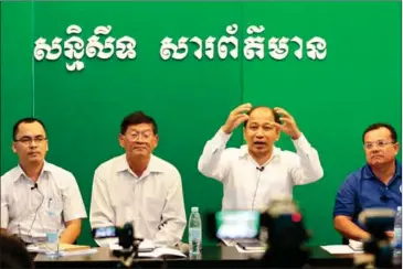  ?? HONG MENEA ?? Comfrel director Koul Panha (second right) speaks at a press conference on the National Election Committee’s work resolving opposition complaints in Phnom Penh yesterday.