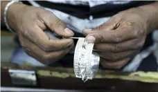  ?? Pawan Singh / The National ?? Workers make jewellery at Al Baroon Gold Factory, in Sharjah’s Al Mareija Street, which was founded in 1988