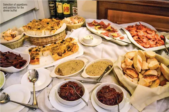  ??  ?? Selection of appetizers and pastries for the dinner buffet