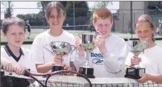  ??  ?? Dundalk Tennis Club members Conor Steen and Barbara Conroy (left), winners of the U-12 Mixed, Neil Walsh, winner of the Boys U-12 Singles and Shauna Murphy, winner of the Girls U-10 singles.